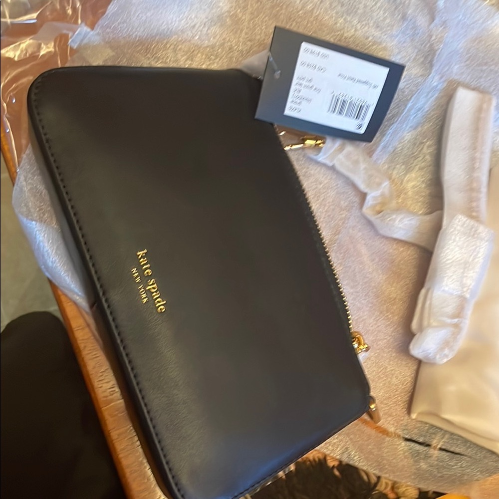 Kate Spade Black and Gold Wristlet Clutch with dust bag , nwt